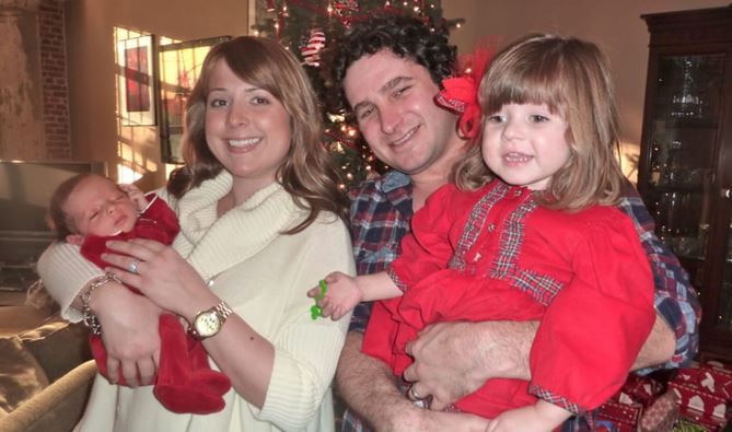 Oliver, Jennifer, Mark and Madeline Hinkle on Christmas Eve 2011.