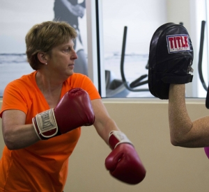 Attorney Jan Thomas practicing boxing
