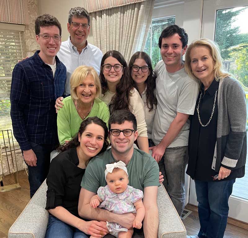Dr. Stacey Rosen (right) and four generations of her family, from her mom (middle row, second from left) to her baby granddaughter. (Photo courtesy of the Rosen family)