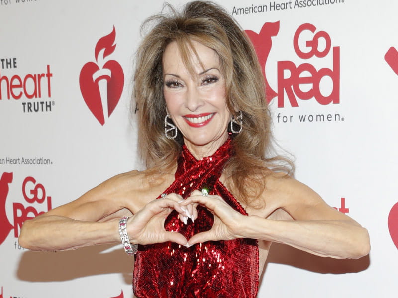 Susan Lucci helps spotlight women and heart disease in January at the American Heart Association's Red Dress Collection Concert in New York City. (Photo by Astrid Stawiarz via Getty Images for the American Heart Association)