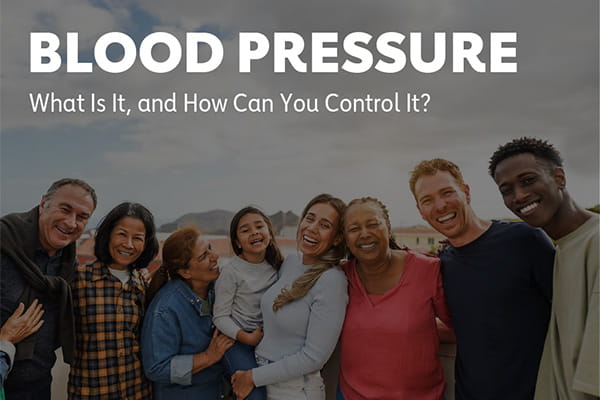 A diverse group of people posing in an outdoor setting with the headline "Blood Pressure - What is it, and how can you control it?" above them.