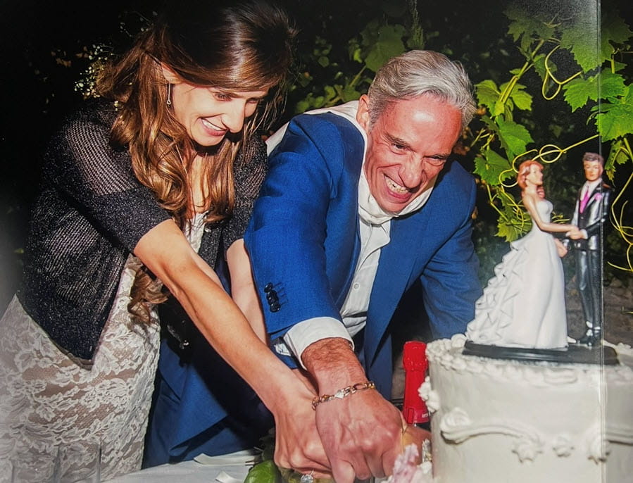 Cristina and Ed cutting their wedding cake