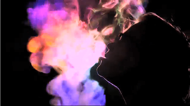 Young woman smoking hookah.