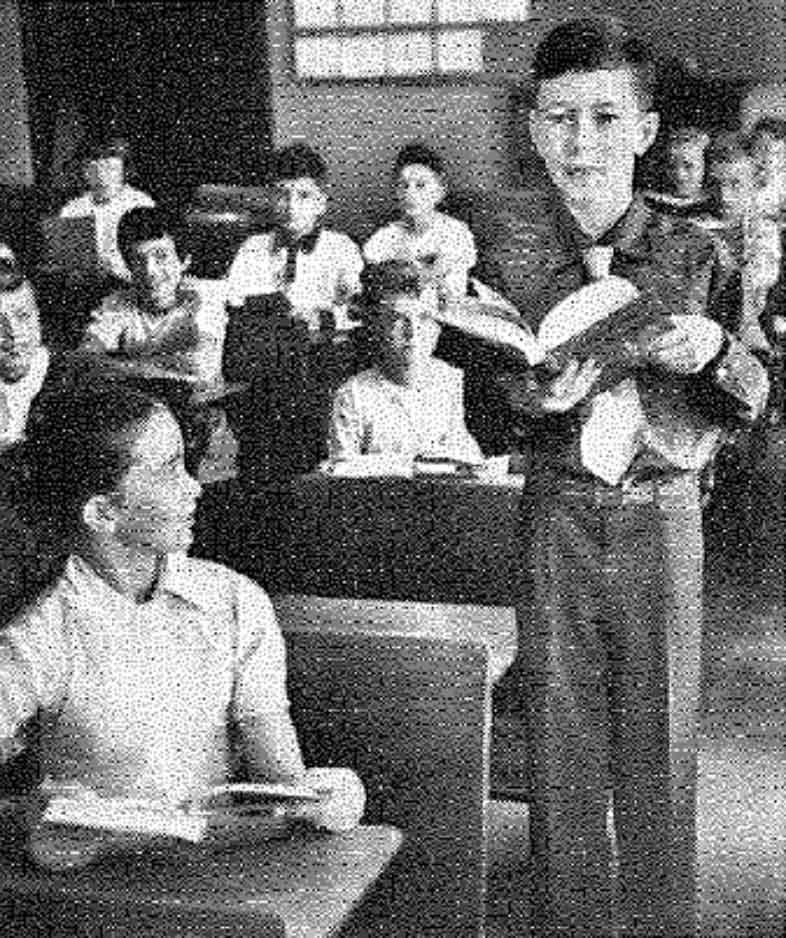 School health program of a Heart Association helped this boy with rheumatic fever to take his place among 'normal' children in the regular classroom, read the caption from the American Heart Association's annual report in 1953. (American Heart Association archives)
