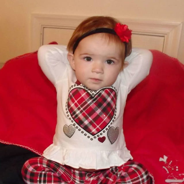 Alyiah as a toddler in a heart shirt