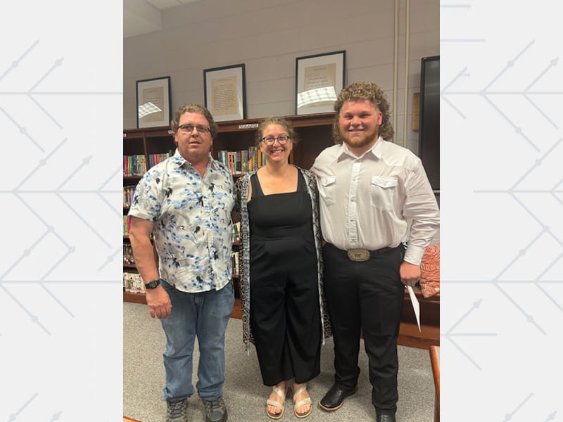 Brian Lipham, Tonia and Logan at Alexandria High School in April 2023