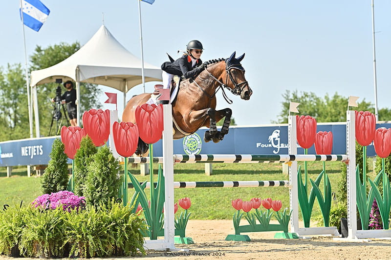 Ryan Haselden and her horse Carla jump to a silver medal at the North American Youth Championships in 2024
