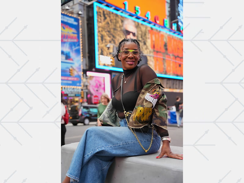 ShantaQuilette D. Carter-Williams takes in the sights at Times Square in New York City in September 2024