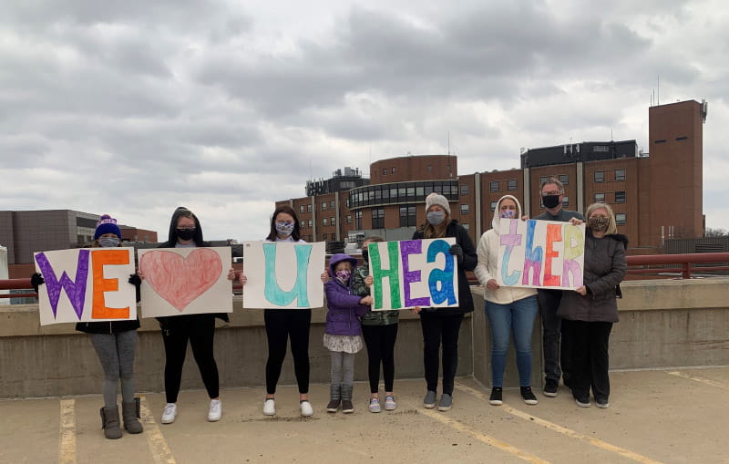 Friends and family of Heather Bardeleben gathered in the parking lot of the hospital, as Heather was hospitalized during the height of the COVID-19 pandemic. (Photo courtesy of Heather Bardeleben)