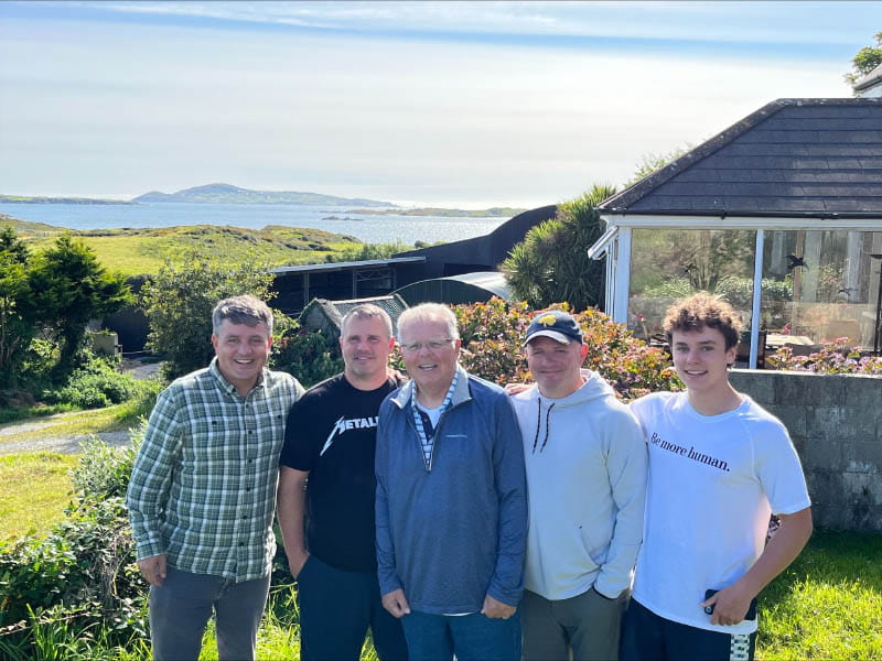 Scott Daley visiting with family at his grandmother's ancestral home in Ireland. From left: Scott, brother Sean, father Frank, brother Steven, and son Gryffin. (Photo courtesy of Scott Daley)