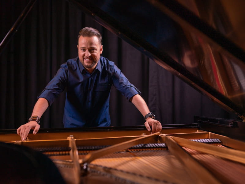 Pianist Paul Cardall was born with a congenital heart defect and he now heals others' hearts through his music. (Photo by Erin Morris Huttlinger)