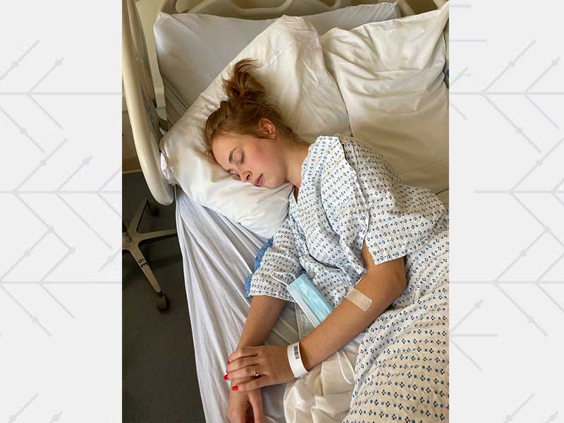 Liv Pines lying in hospital bed