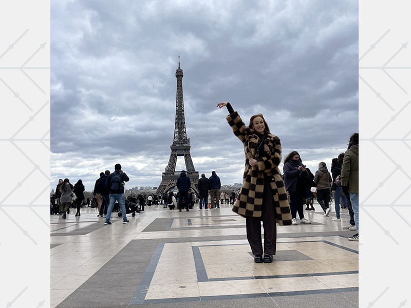 Liv Pines posing in front of the Eiffel Tower in Paris