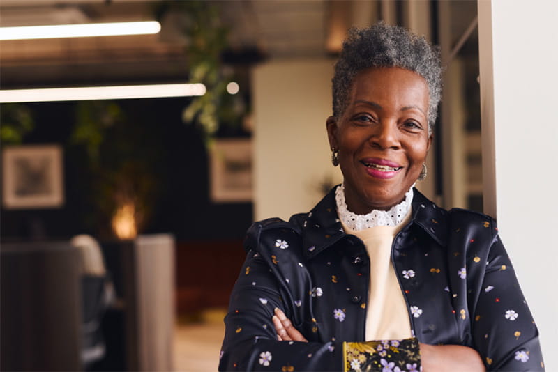 Portrait of a business woman smiling in her office