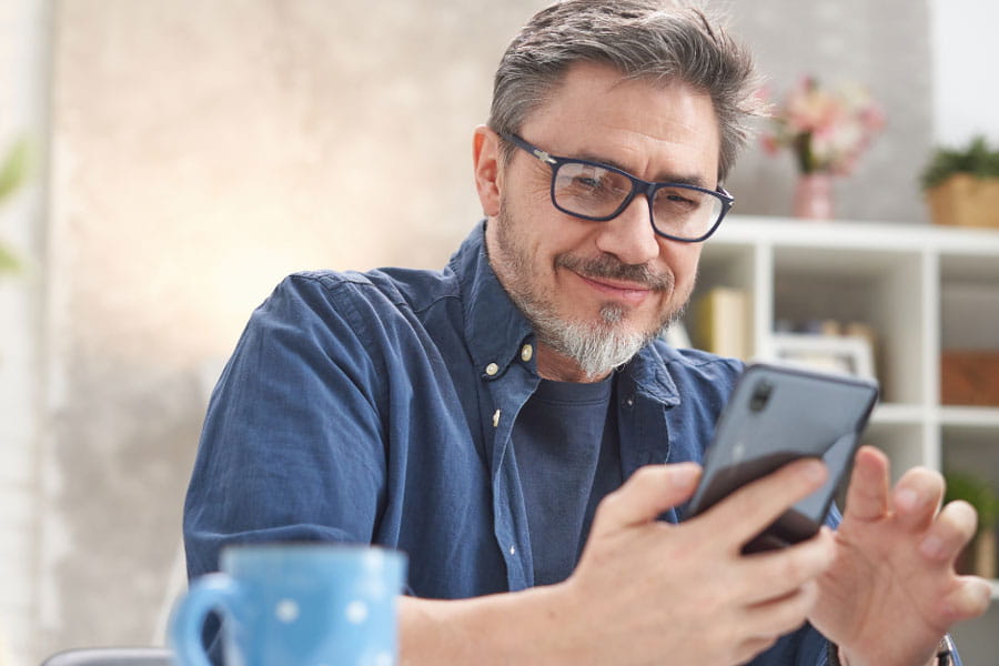 Man looking at his mobile phone