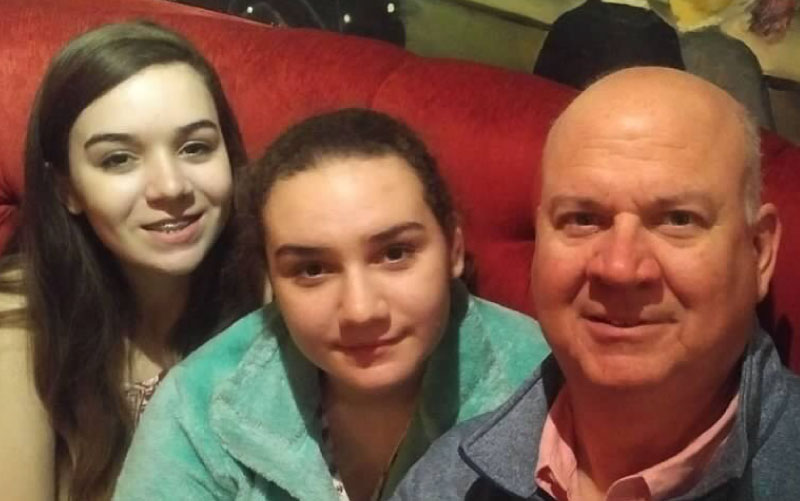 Peter Woods with daughters, Anna (left) and Olivia.(Photo courtesy of Peter Woods)