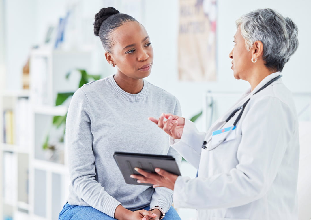 African American Patient with Doctor