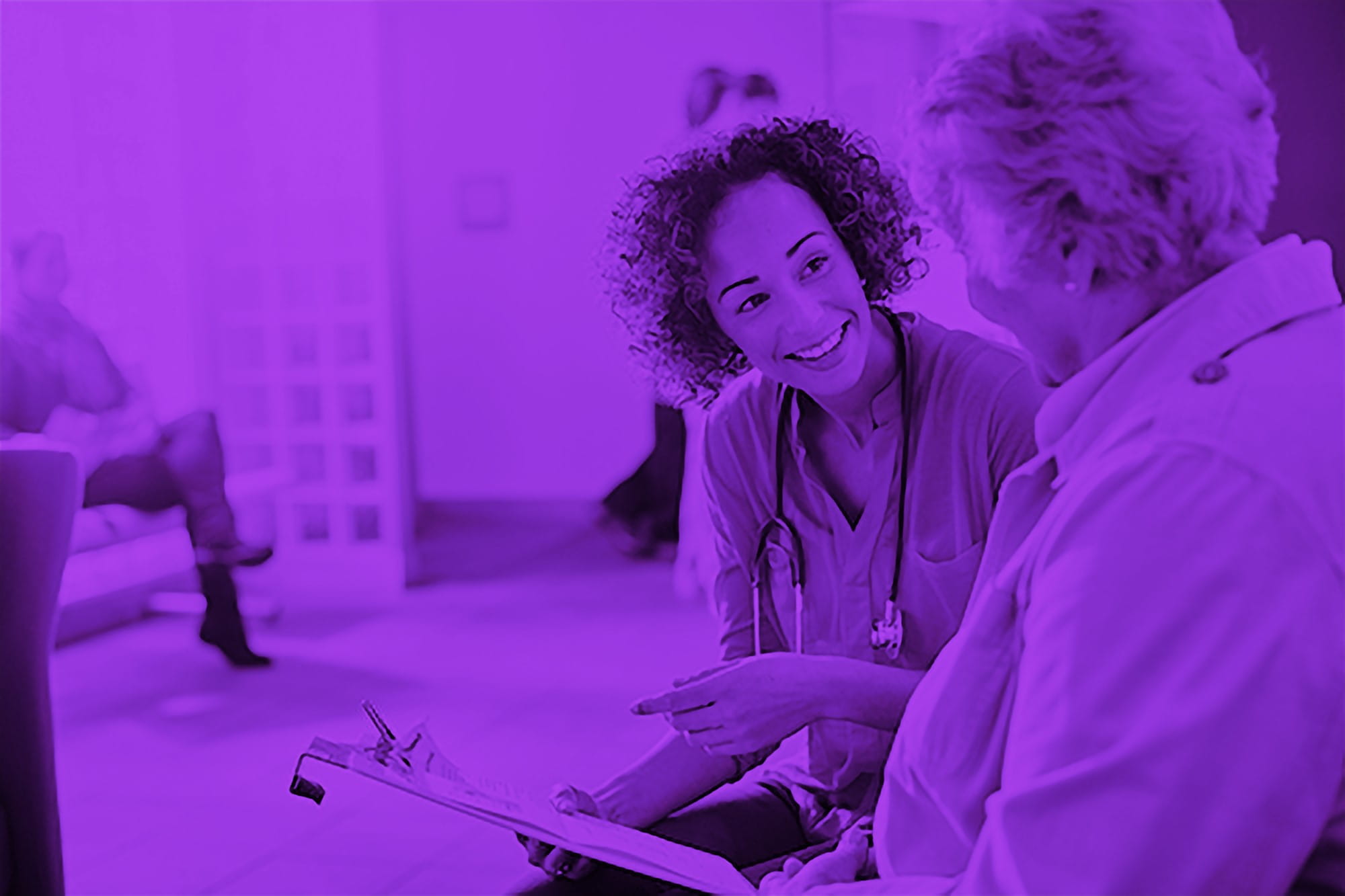 doctor speaking with patient