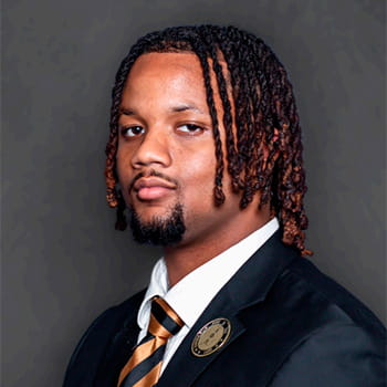 Headshot of Dersen Evans