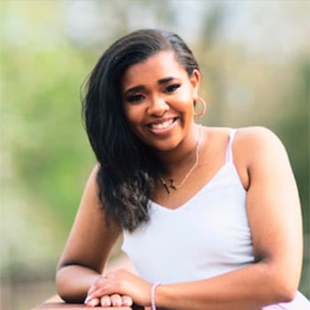 Headshot of Reina Hartfield