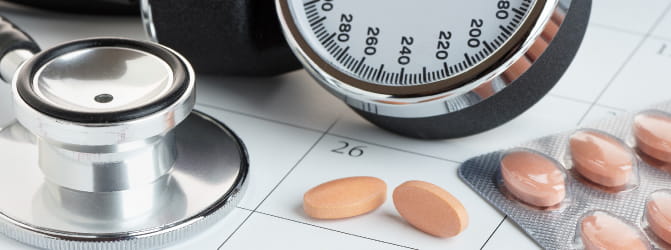 Photo of medication and blood pressure meter