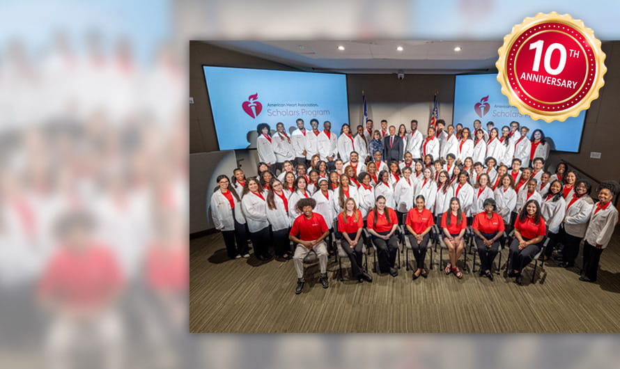 Tiered group photo of American Heart Association Scholars at the program's symposium with a 10th anniversary graphic seal in the upper right corner