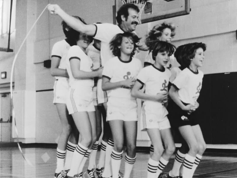 With their coach, physical education teacher Richard Cendali (center), the Skip-Its were the 1981 national demonstration team for Jump Rope For Heart, a school-based challenge that preceded today's Kids Heart Challenge and American Heart Challenge. The jump-rope squad was from Boulder Valley, Colorado, schools. (American Heart Association archives)