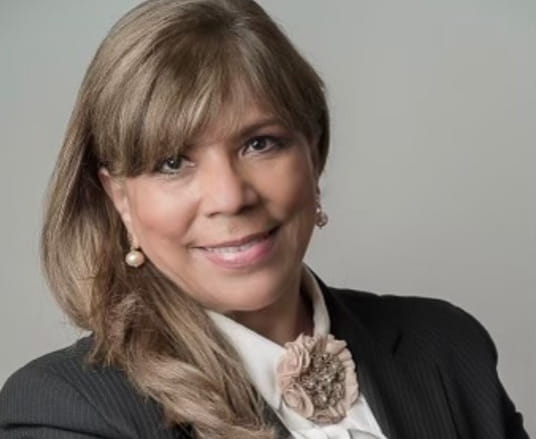 Professional headshot of Gina Miranda-Diaz