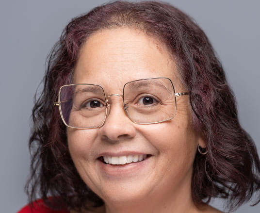 Professional headshot of Mercedes Cruz