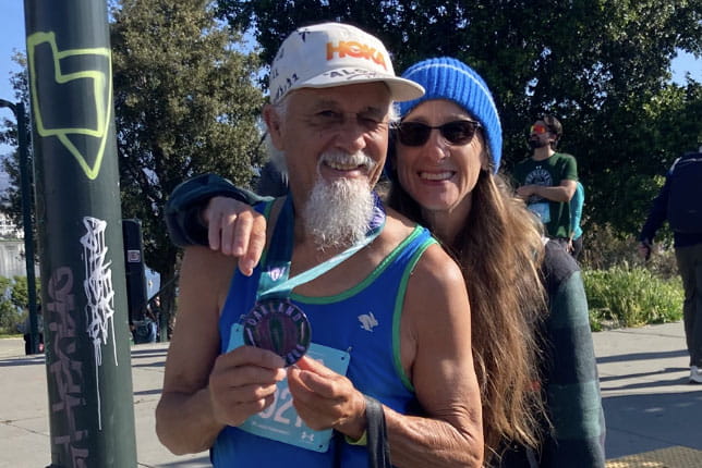Tracie with her husband at a race