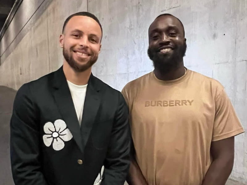 Cardiac arrest survivor Omar Carter (right) with longtime friend and high school teammate Steph Curry. (Photo courtesy of Omar Carter)