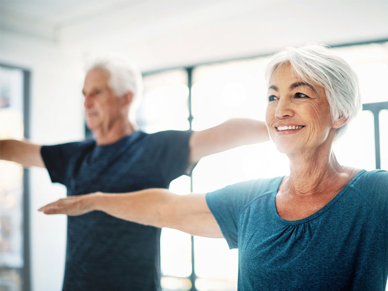 Healthy Senior Living Yoga Couple