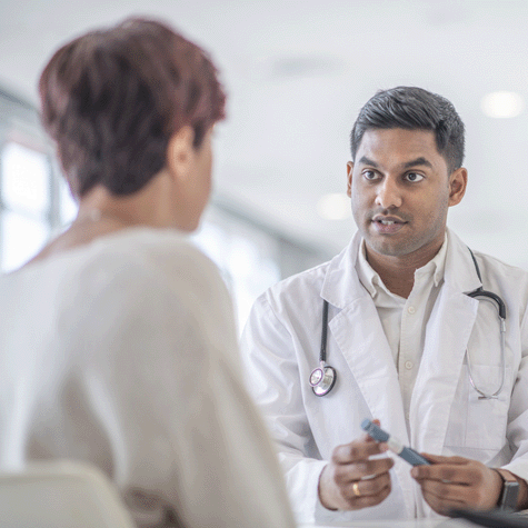 Diabetes doctor talking with a patient