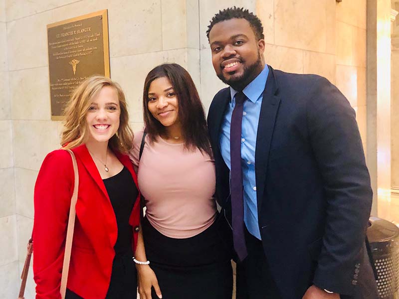 Three underrepresented students - two females one male - from Boston University - SURE scholars 